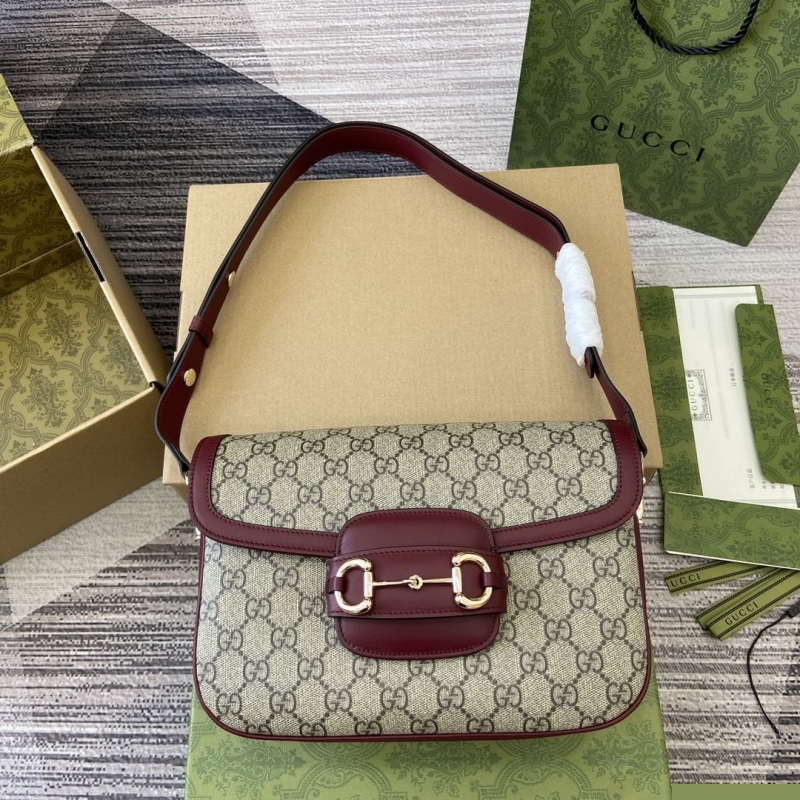 G*u*i top handle bags